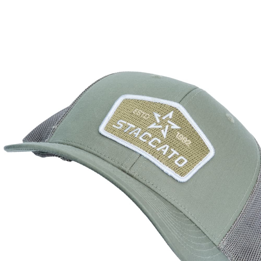 Staccato Badge Trucker Hat